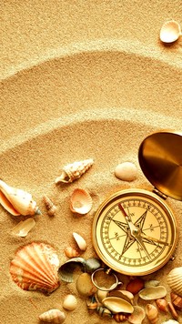 Kompas na piasku