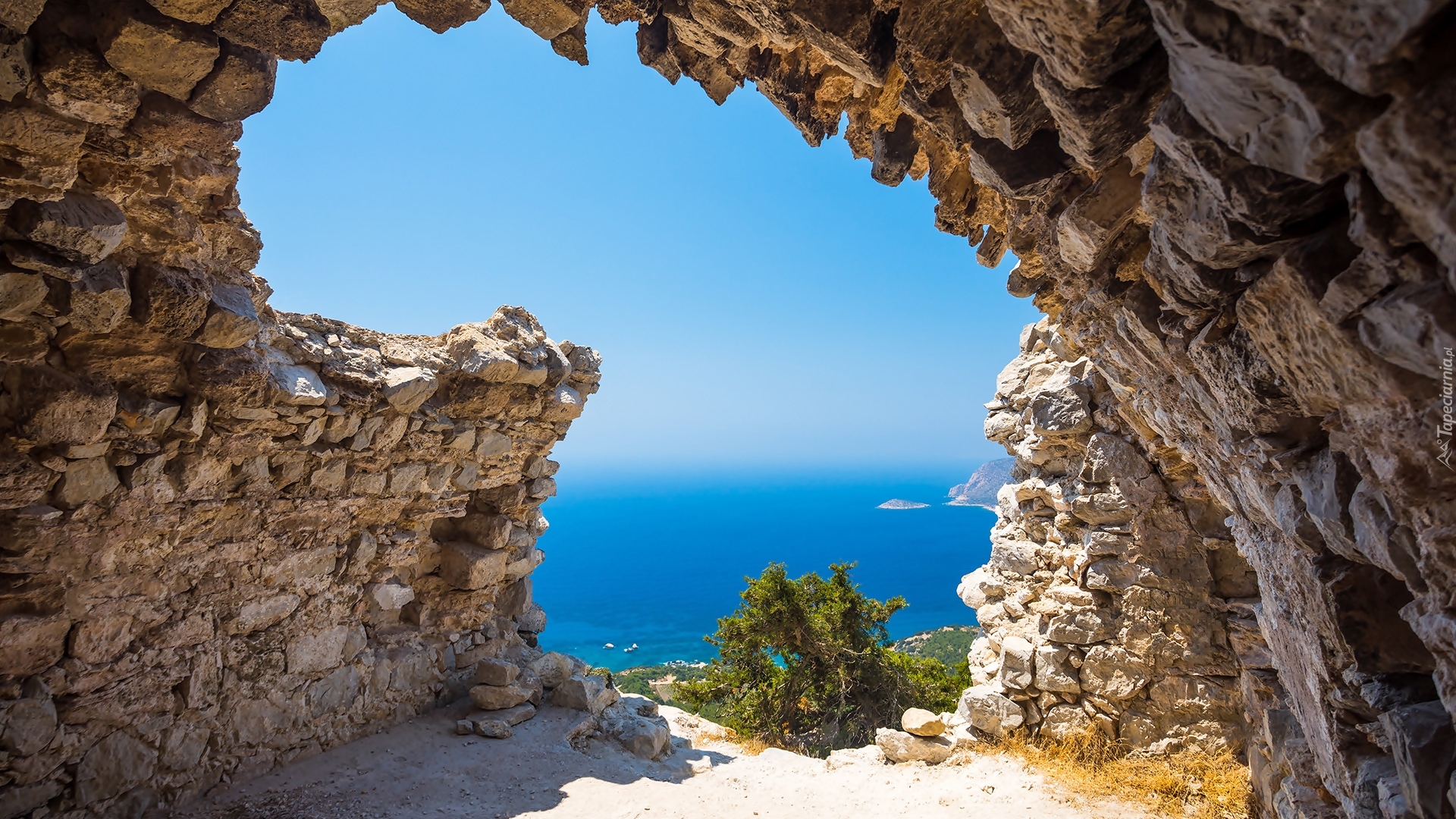 Grecja, Wyspa Rodos, Miejscowość Monolitos, Skały, Morze Egejskie, Ruiny zamku, Ściana, Widok