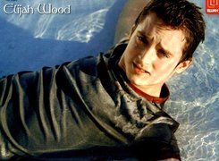 Elijah Wood,niebieskie oczy, woda