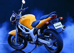 Motory Suzuki,kierownica,lusterka,tłumik , siedzenie ,światła ,koła,opony