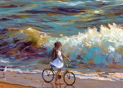 Dziewczynka z rowerem nad brzegiem morza