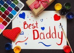 Kartka z napisem Best Daddy obok farbek
