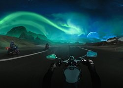 Motocykle na drodze i zorza polarna na niebie