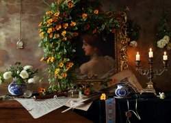 Obraz kobiety obok świecznika i kwiatów