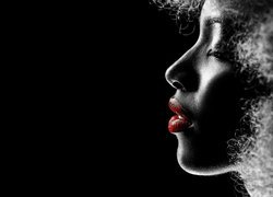 Profil czarnoskórej kobiety z czerwonymi ustami