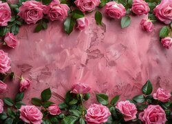 Ramka z różowych róż z listkami na różowym tle