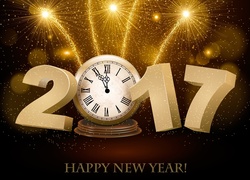 Zegar odmierzający czas do nowego roku 2017 z fajerwerkami na niebie