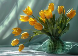 Żółte tulipany w szklanym wazonie