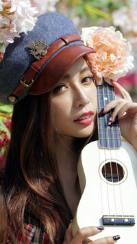 Azjatka z ukulele