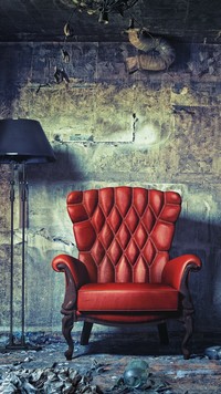 Czerwony fotel w starym pokoju