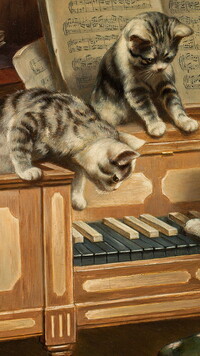 Dwa kotki na pianinie