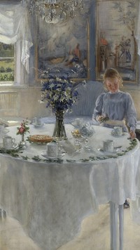 Dziewczynka dekorująca stół