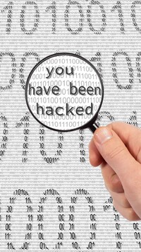 Napis pod lupą you have been hacked