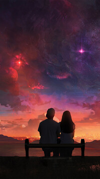 Para na ławce oglądająca niebo