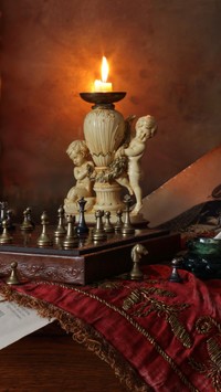 Rozgrywki szachowe przy świecy