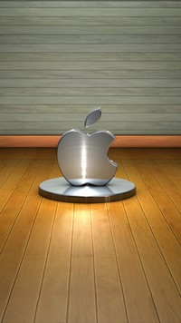 Srebne logo Apple na podstawce