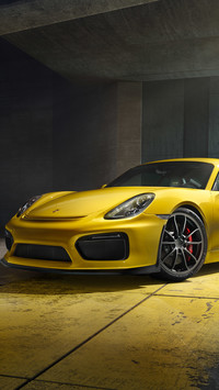 Żółte Porsche Cayman GT4 w garażu