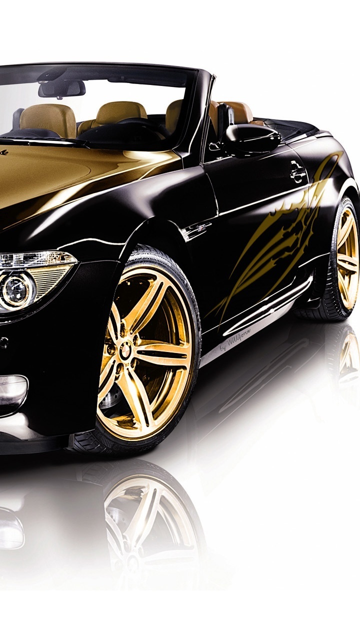 Czarne BMW ze złotymi felgami