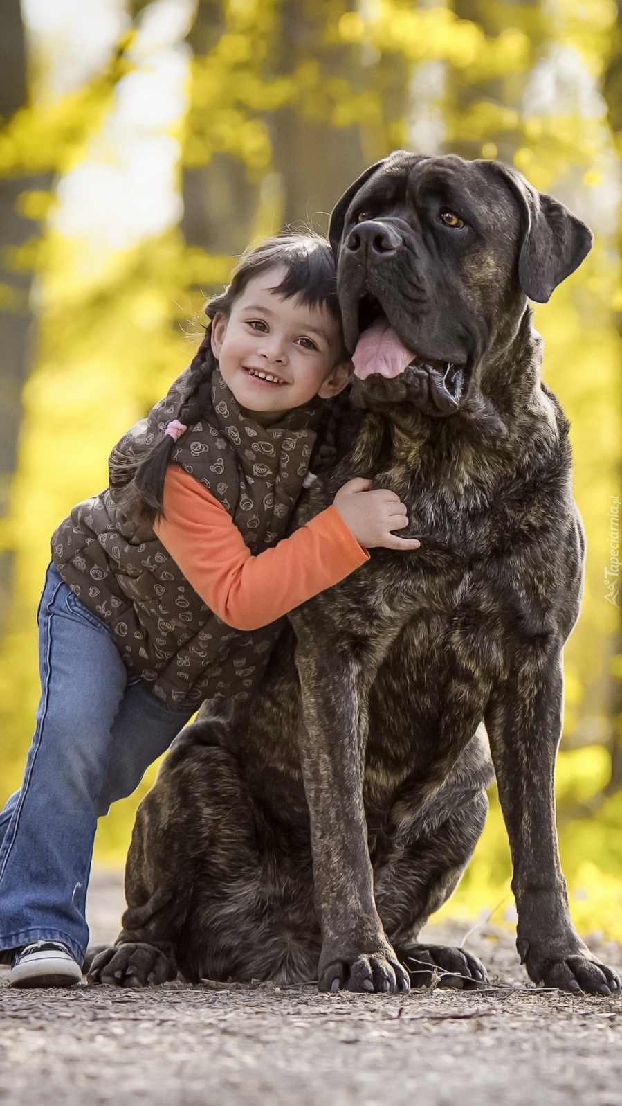 Dziecko z psim przyjacielem