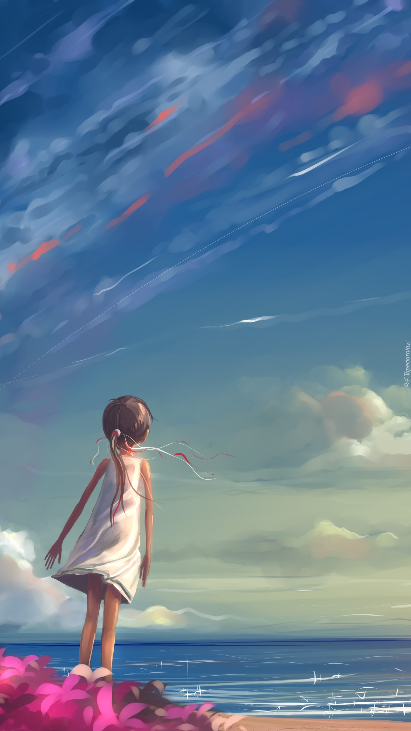 Dziewczynka spoglądająca w niebo