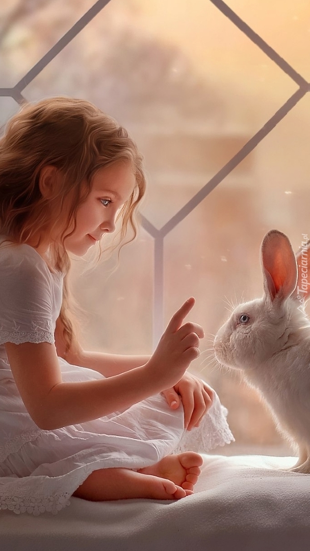 Dziewczynka z białym królikiem
