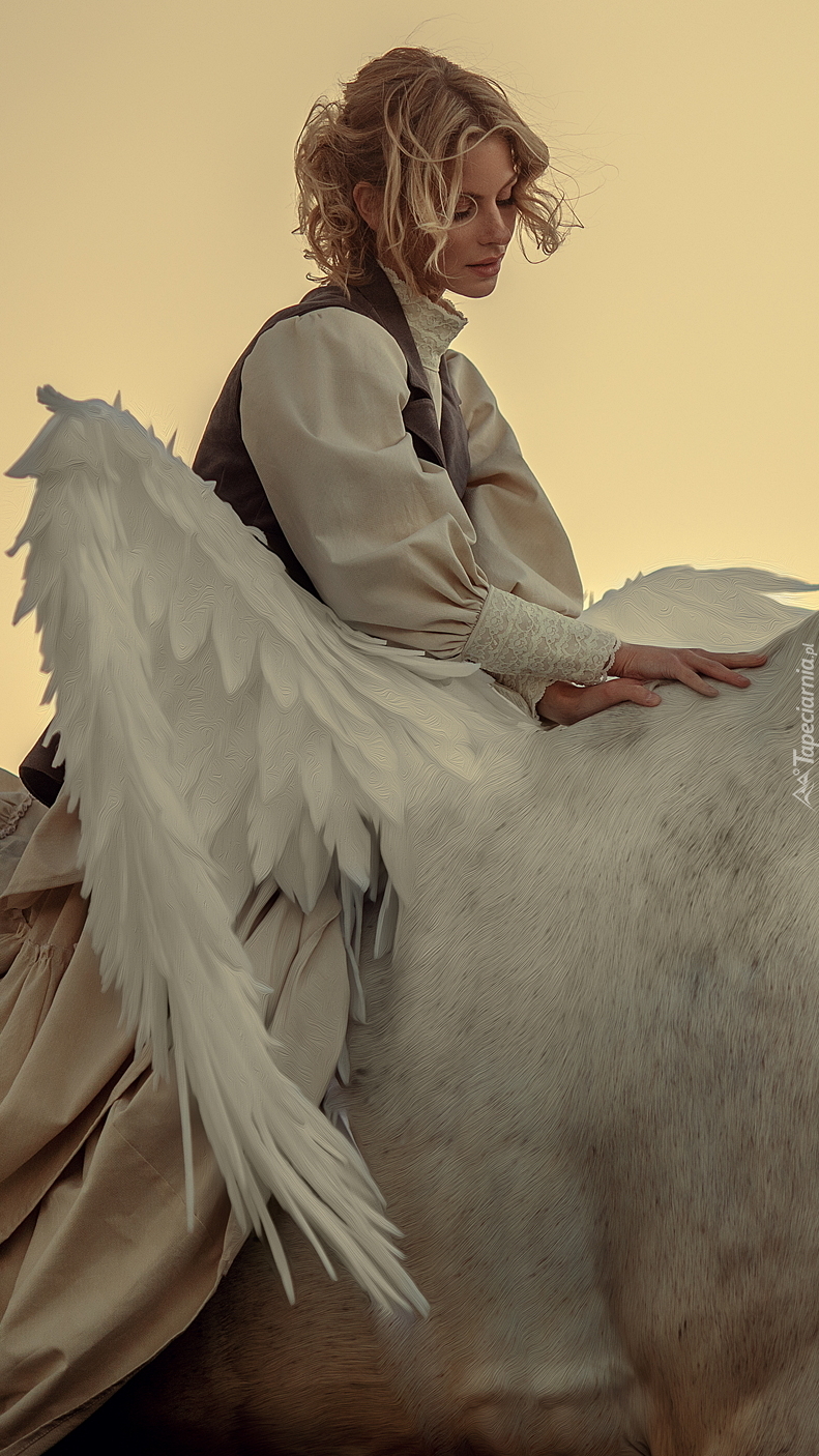Kobieta na białym koniu