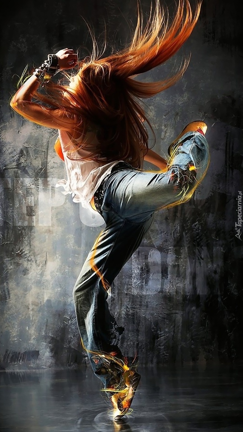 Rudowłosa dziewczyna w tańcu