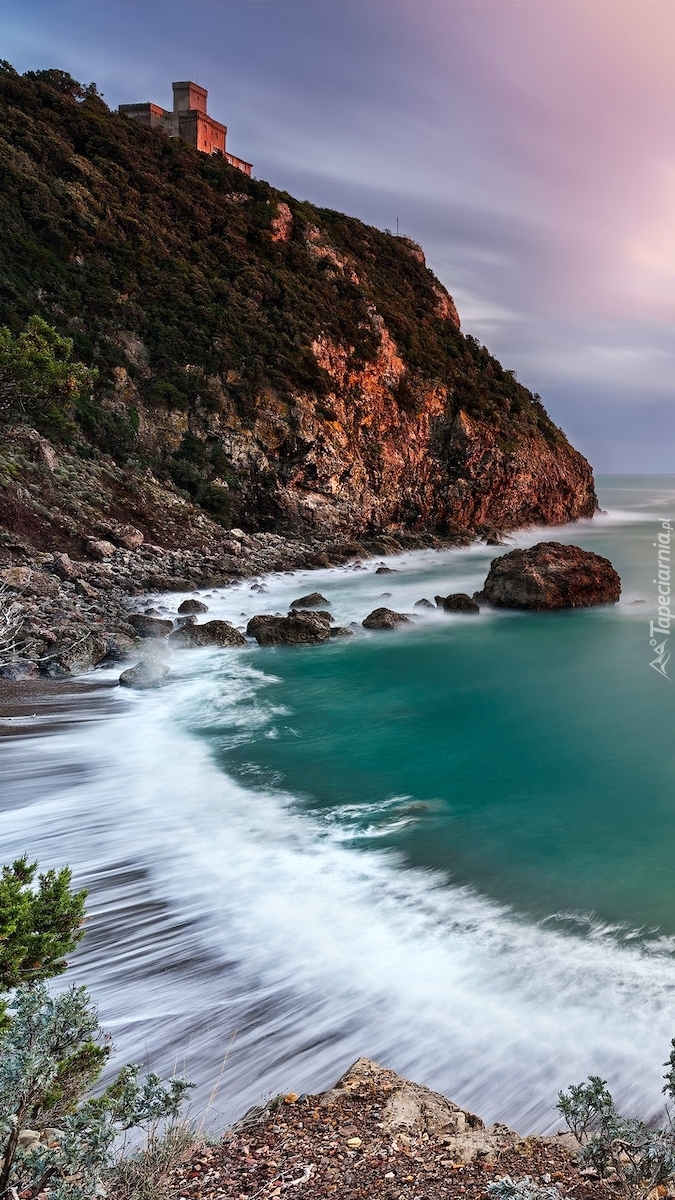 Skały na plaży Cala del Leone