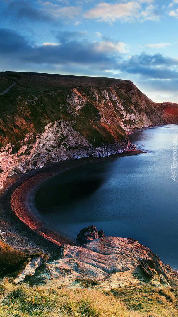 Wschód słońca nad zatoką Lulworth Cove