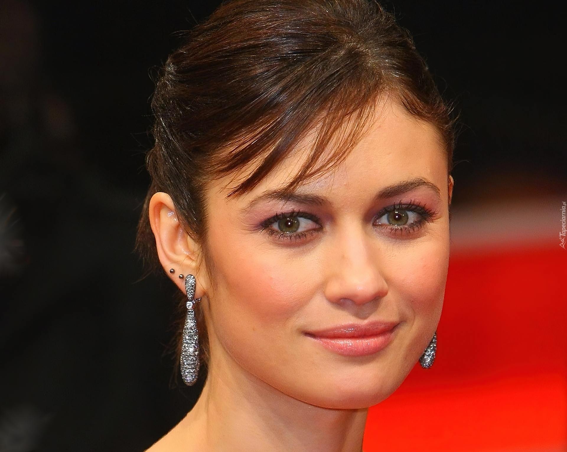 Olga Kurylenko, Twarz