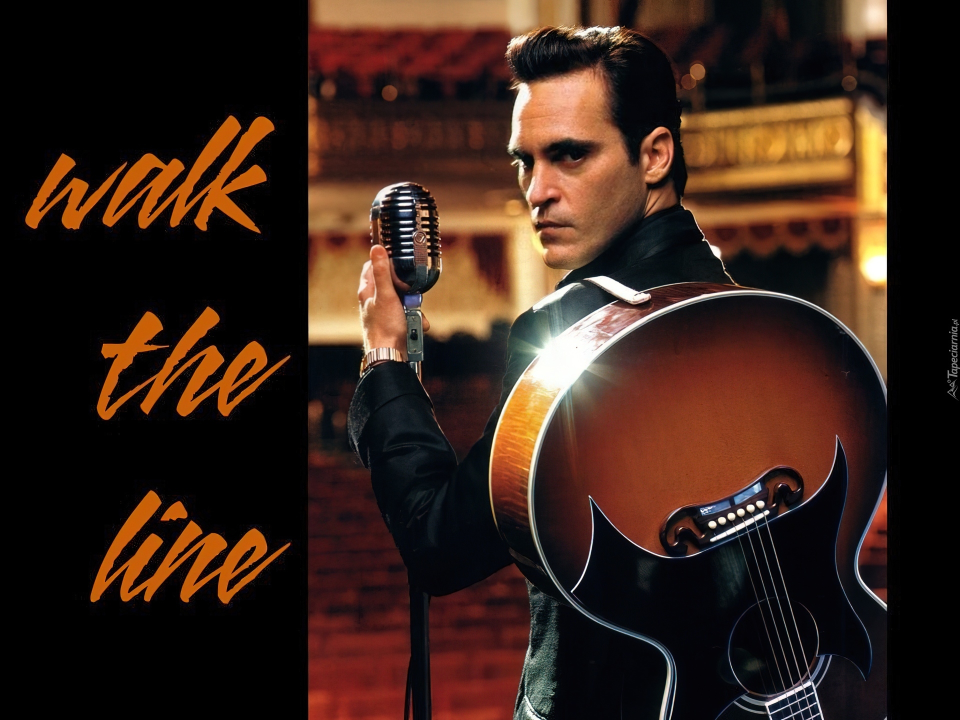 Joaquin Phoenix,mikrofon, gitara