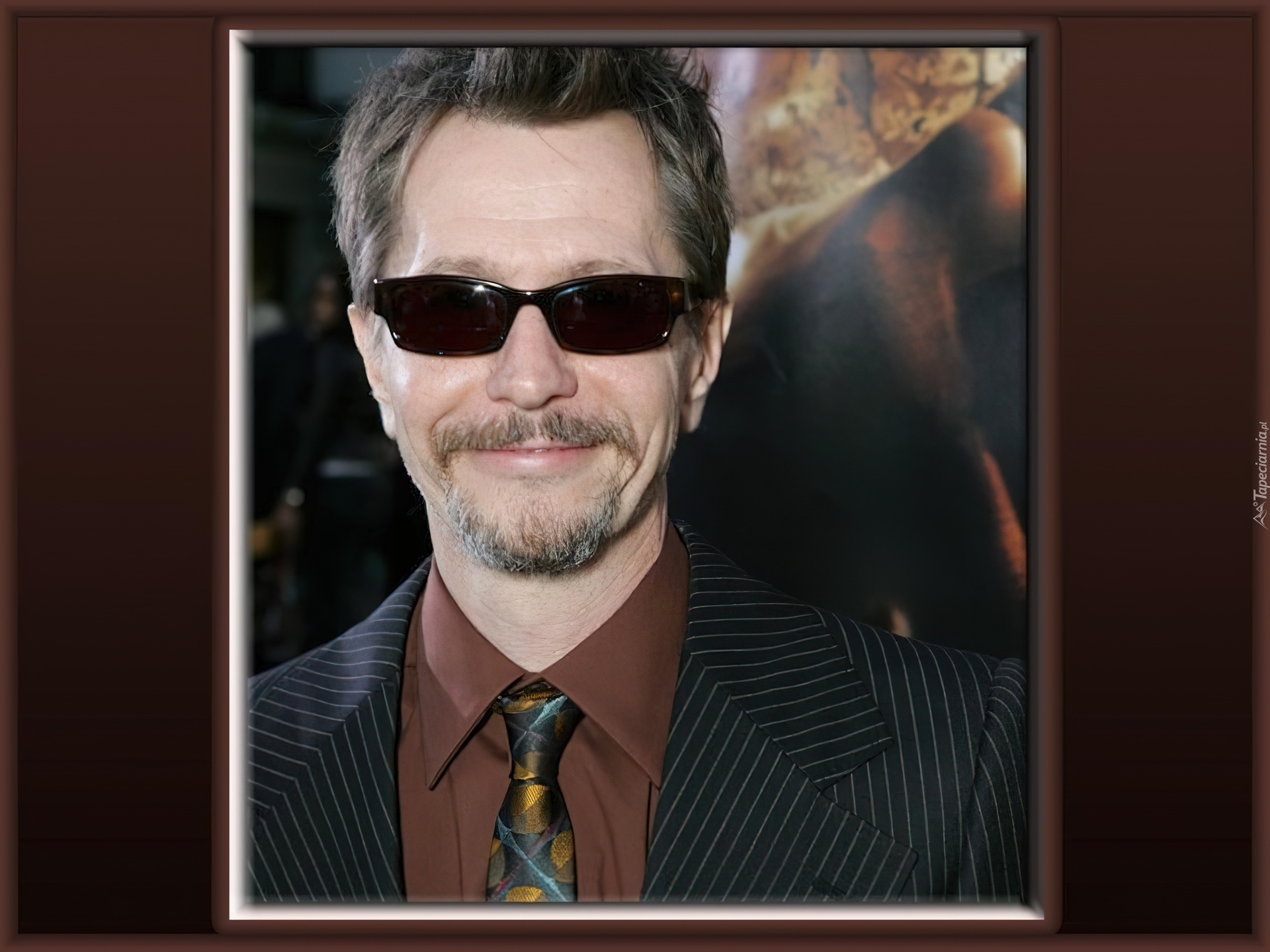 Gary Oldman,okulary, broda