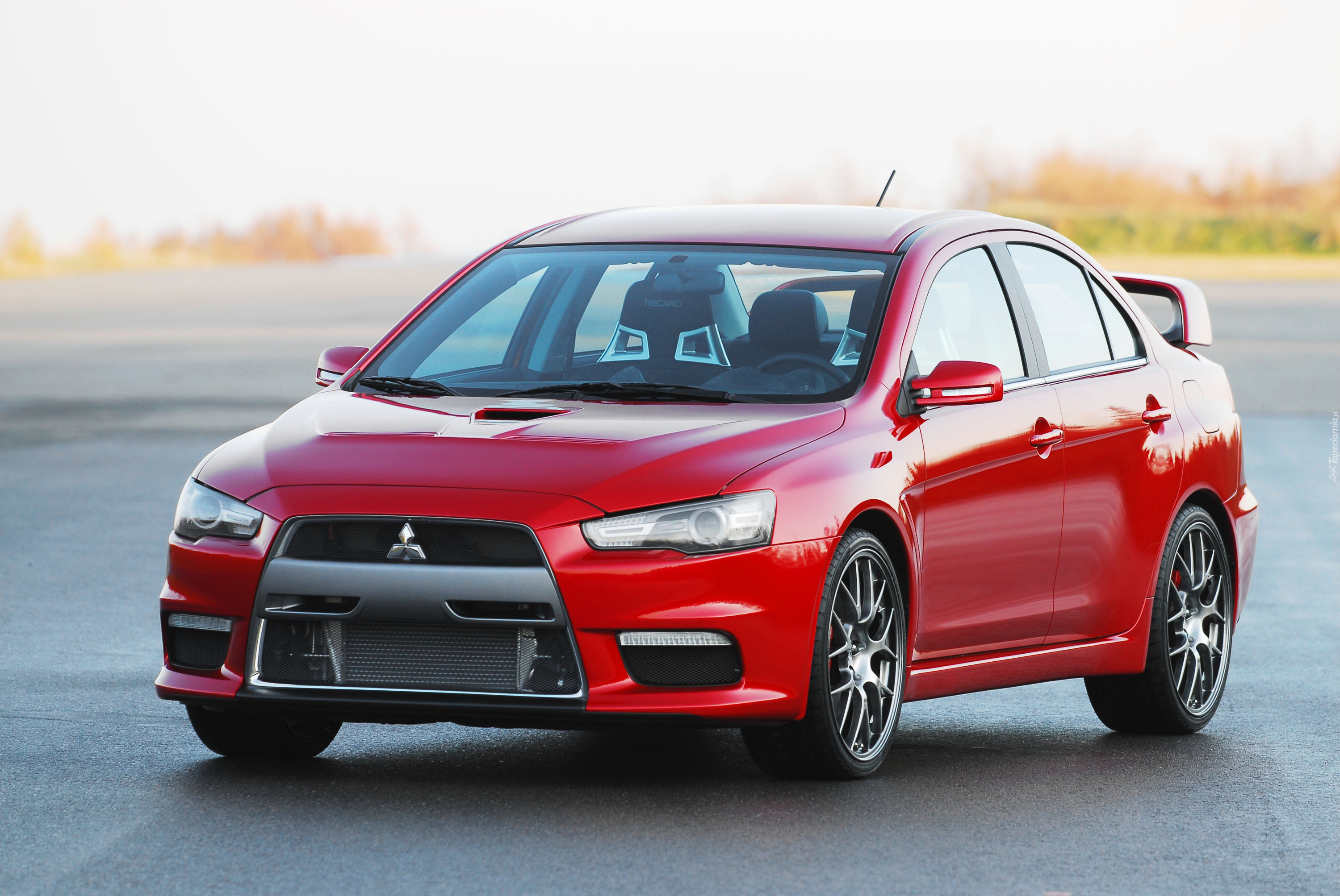 Мицубиси санкт петербург. Mitsubishi Lancer EVO 11. Mitsubishi Lancer Evolution 12. Митсубиси Лансер 10. Lancer Evolution 10.