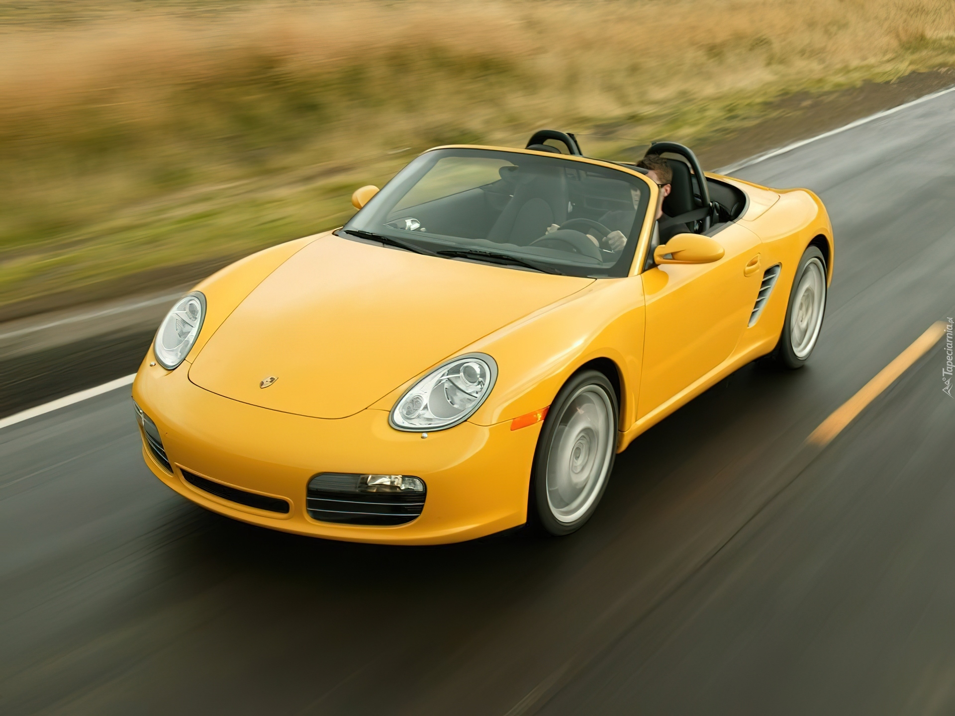 Żółte Porsche Boxster