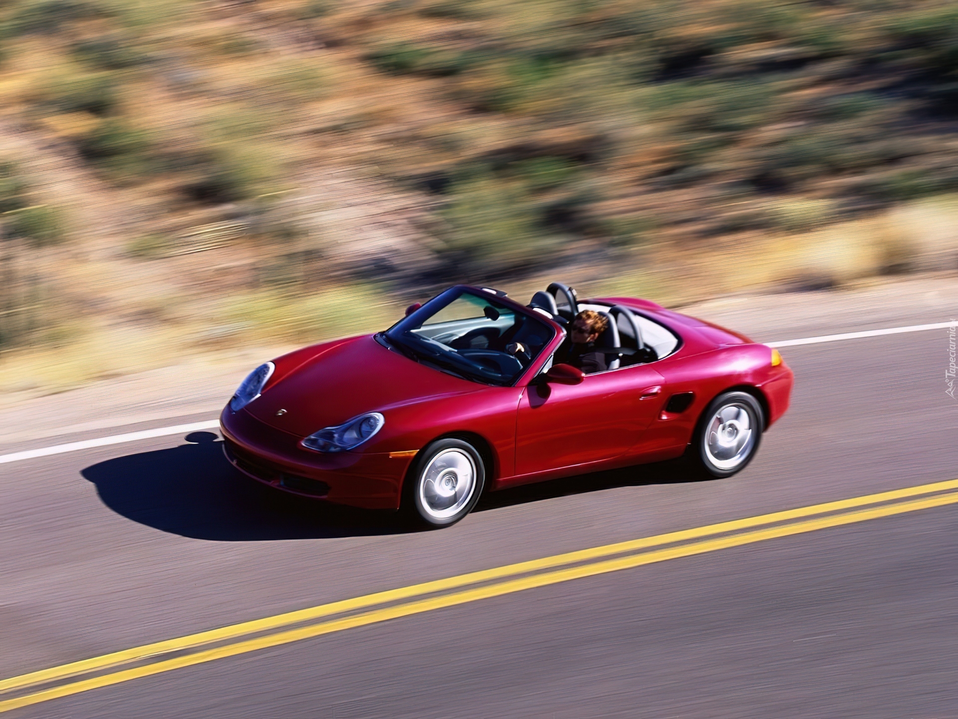 Bordowe Porsche boxster