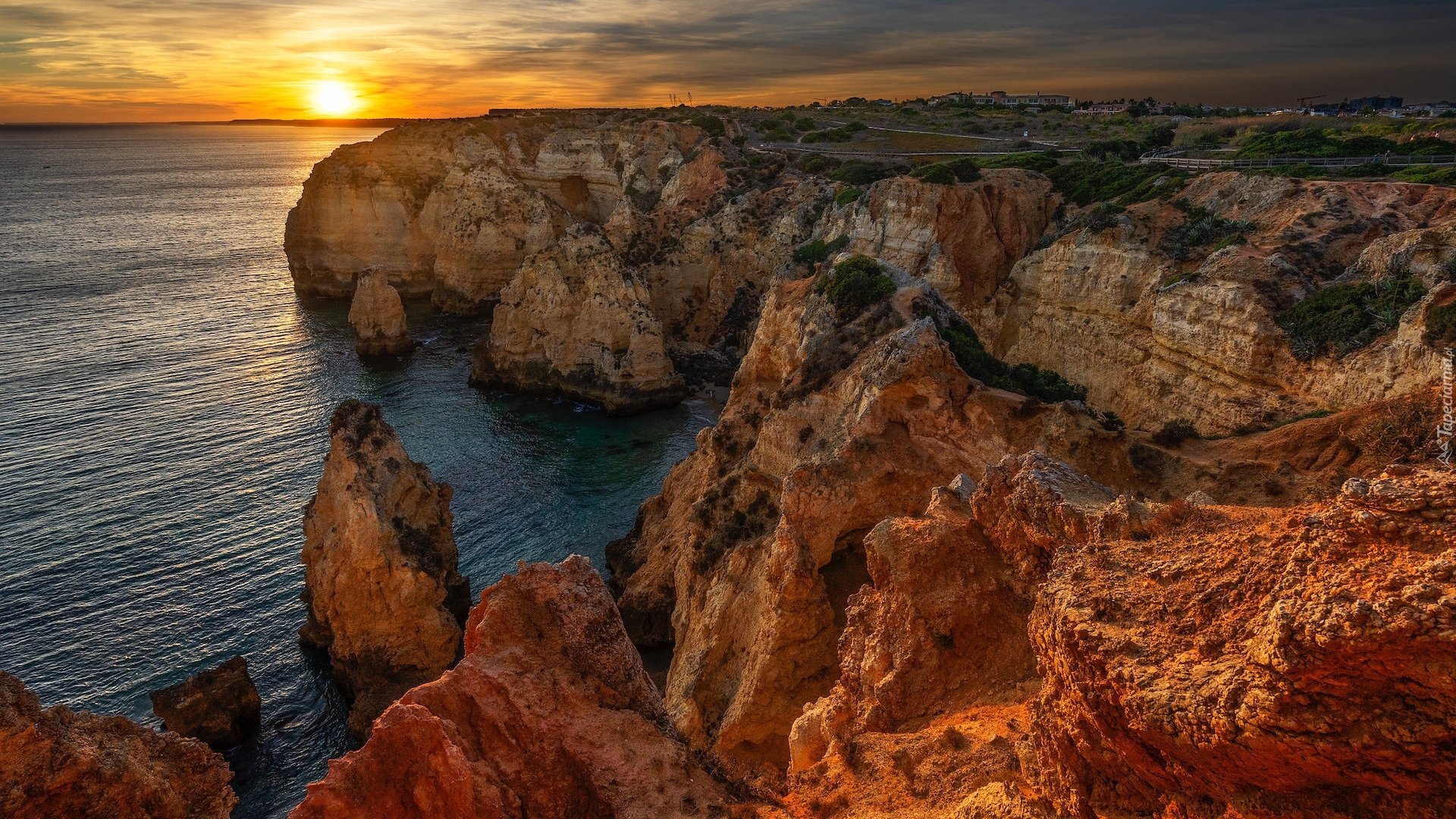 Portugalia, Region Algarve, Cypel, Ponta da Piedade, Morze, Skały, Zachód słońca