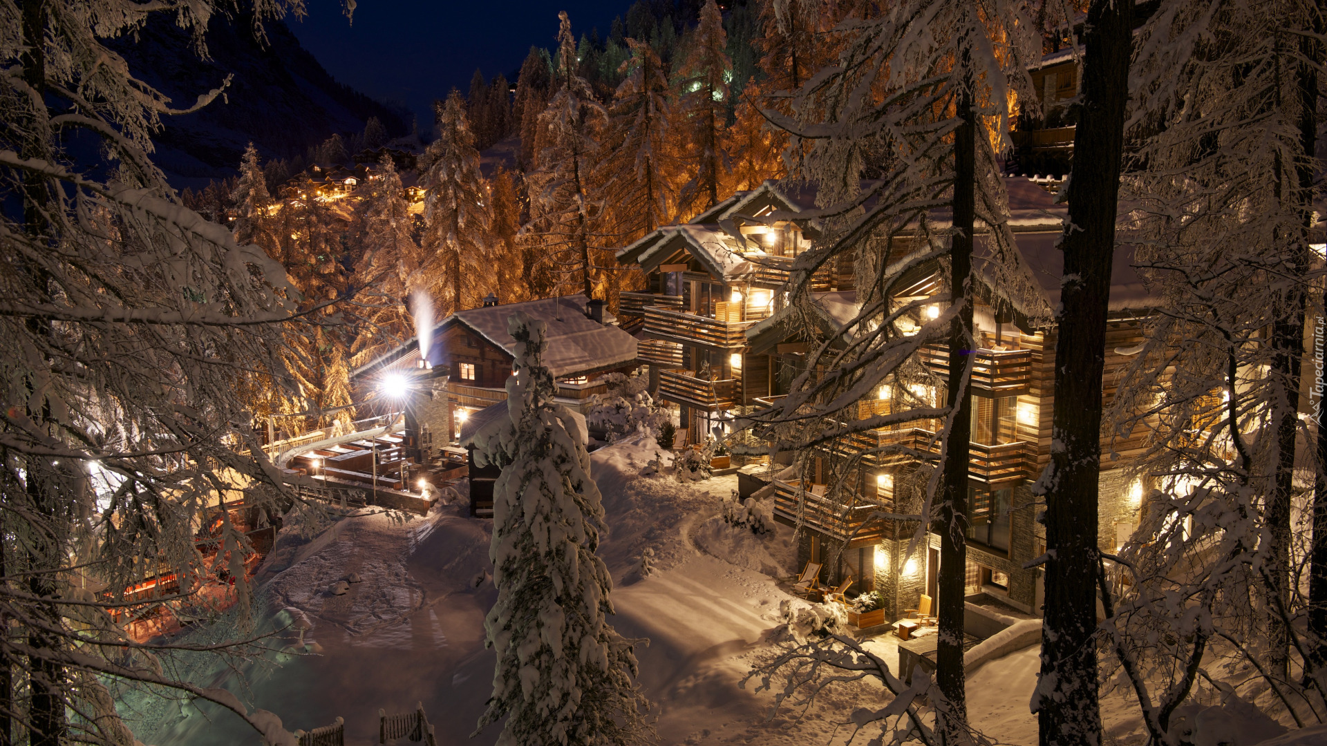 Szwajcaria, Kanton Valais, Zermatt, Hotel, CERVO Mountain Boutique Resort, Oświetlone, Domy, Zima, Wieczór, Ośnieżone, Drzewa