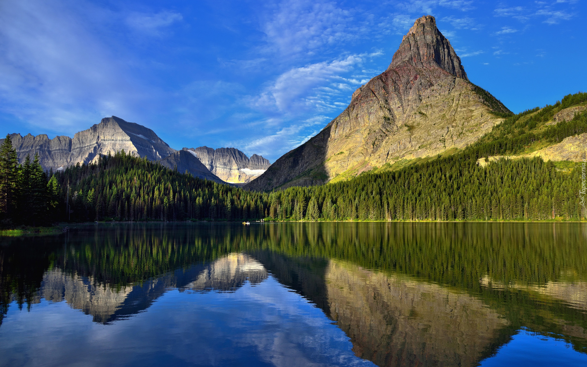 Stany Zjednoczone, Montana, Park Narodowy Glacier, Góry, Lewis Range, Góra, Grinnell Mountain, Jezioro, Swiftcurrent Lake, Lasy, Drzewa, Odbicie, Niebo