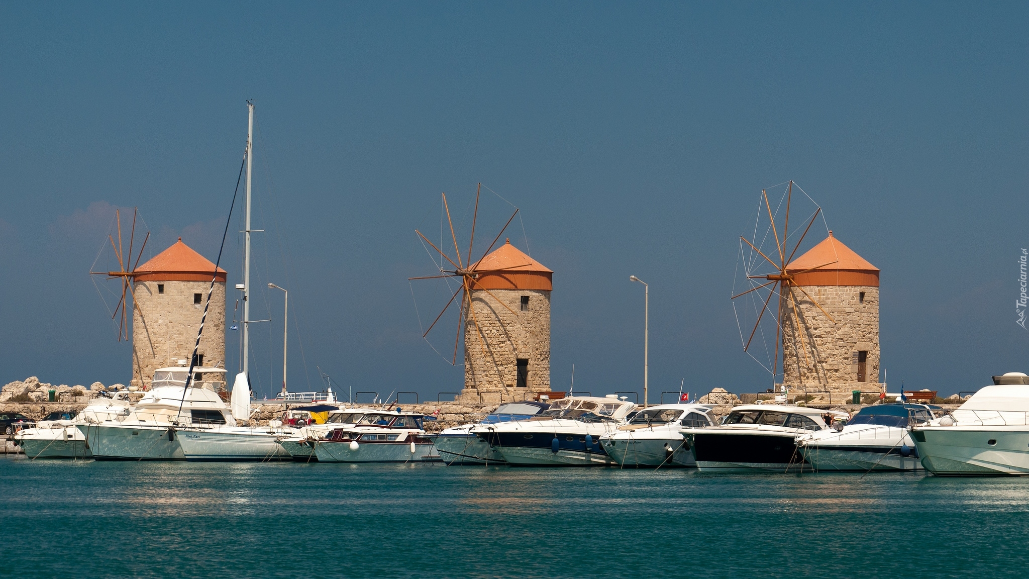 Grecja, Wyspa Rodos, Port jachtowy Mandraki, Wiatraki, Motorówki