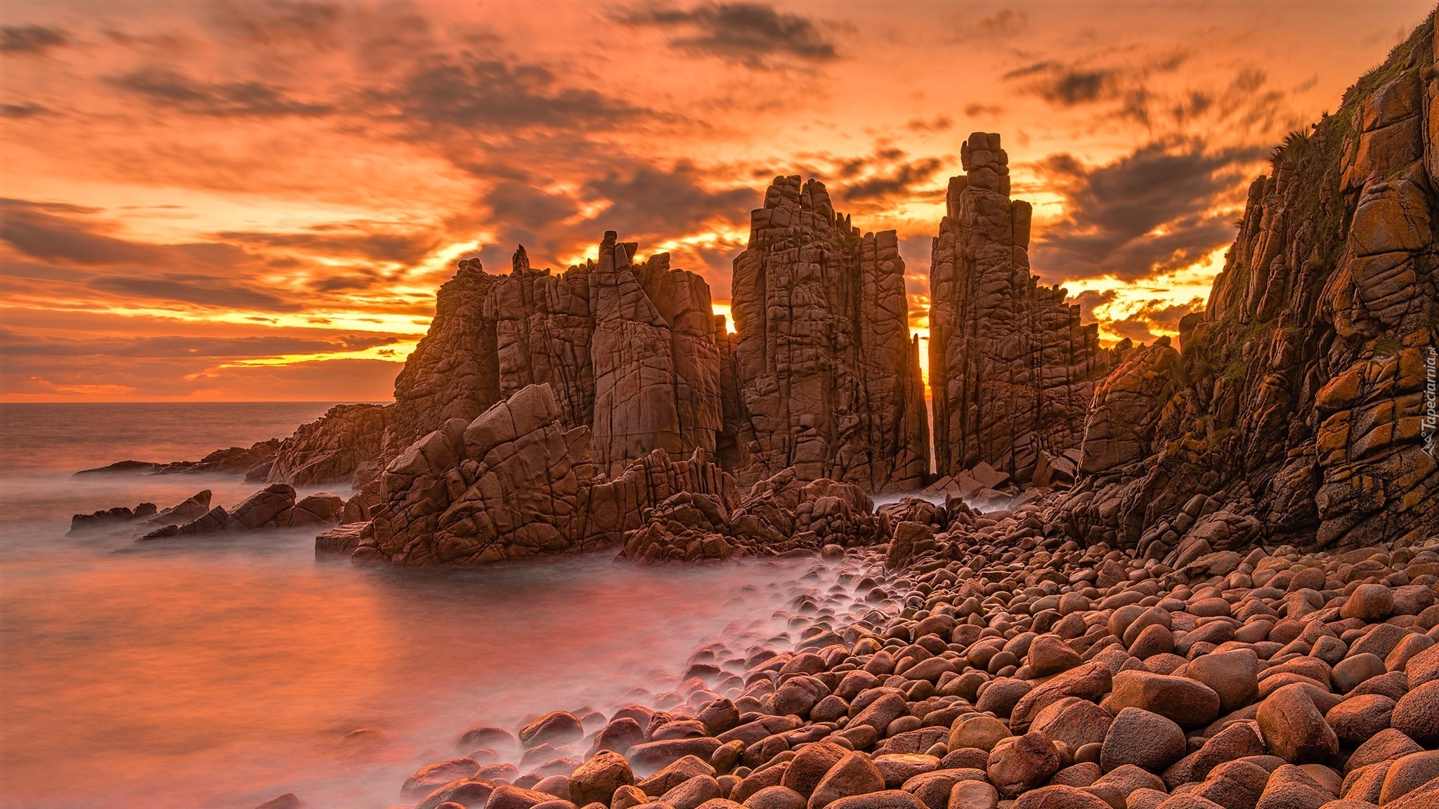 Australia, Wyspa Phillip Island, Przylądek Cape Woolamai, Morze, Zachód słońca, Skały, Kamienie