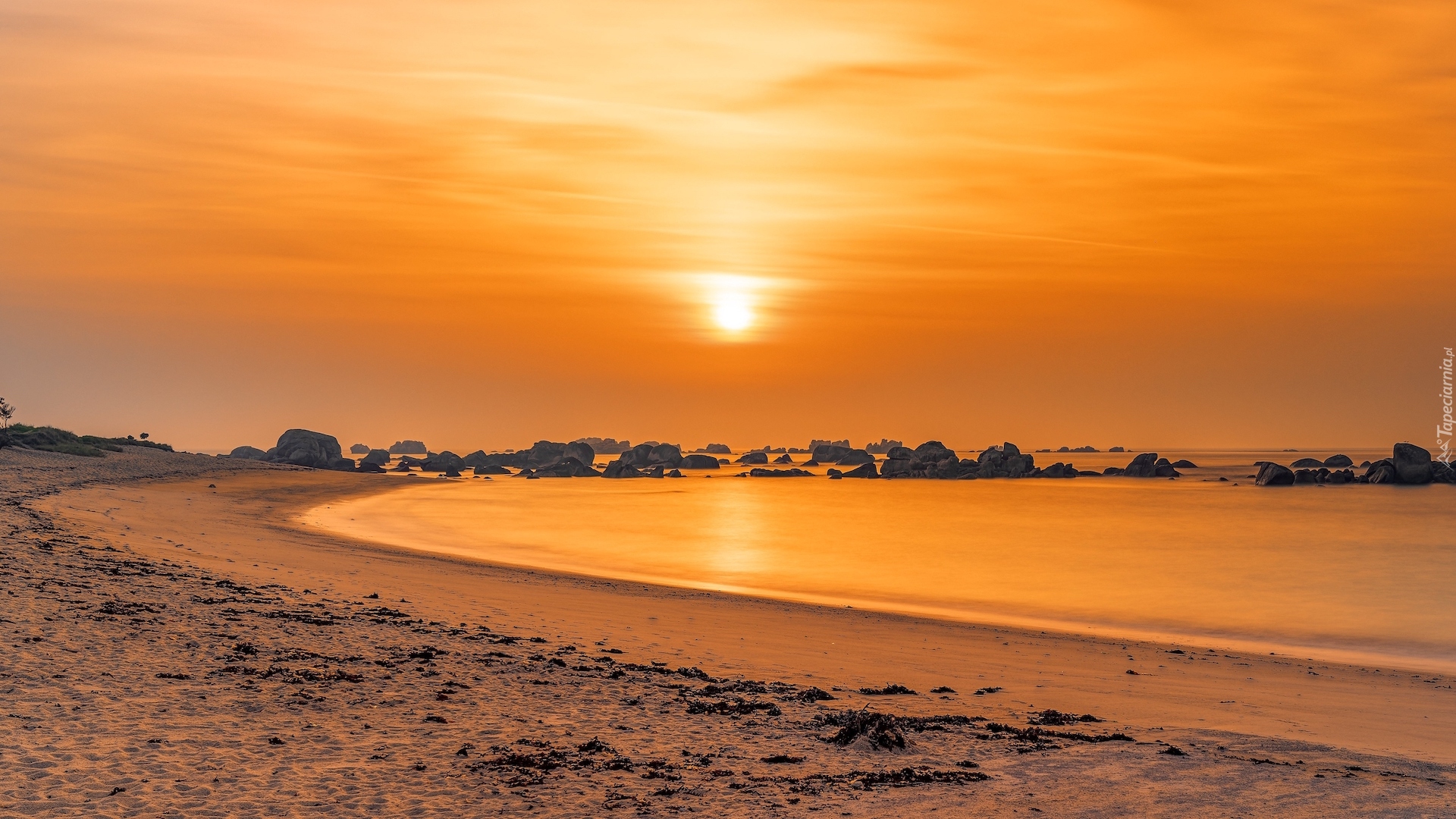 Zachód słońca, Morze, Plaża, Skały, Głazy, Piasek, Brignogan Plage, Bretania, Francja