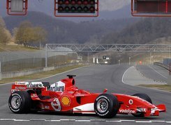 Formuła 1,bolid,opony, kask , koła, spojler