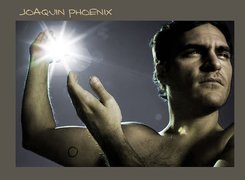 Joaquin Phoenix,twarz, ręce