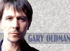 Gary Oldman,krótkie włosy, niebieskie oczy