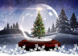 Choinka w śnieżnej kuli jako dekoracja bożonarodzeniowa