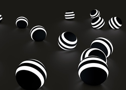 Czarno-białe odblaskowe kule w grafice 3D