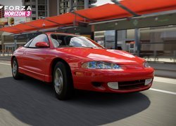 Czerwony samochód na drodze w grze Forza Horizon 3