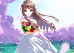 Długowłosa dziewczyna w sukience i bukietem kwiatów