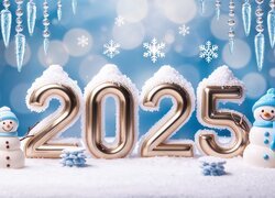 Dwa bałwanki obok ośnieżonej daty 2025