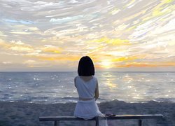 Dziewczyna na ławce obserwująca wschód słońca nad morzem